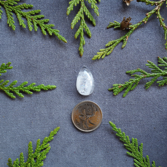 13.5ct Clear Quartz Cabochon With Rainbow inclusions, Skeena River, BC, Canada