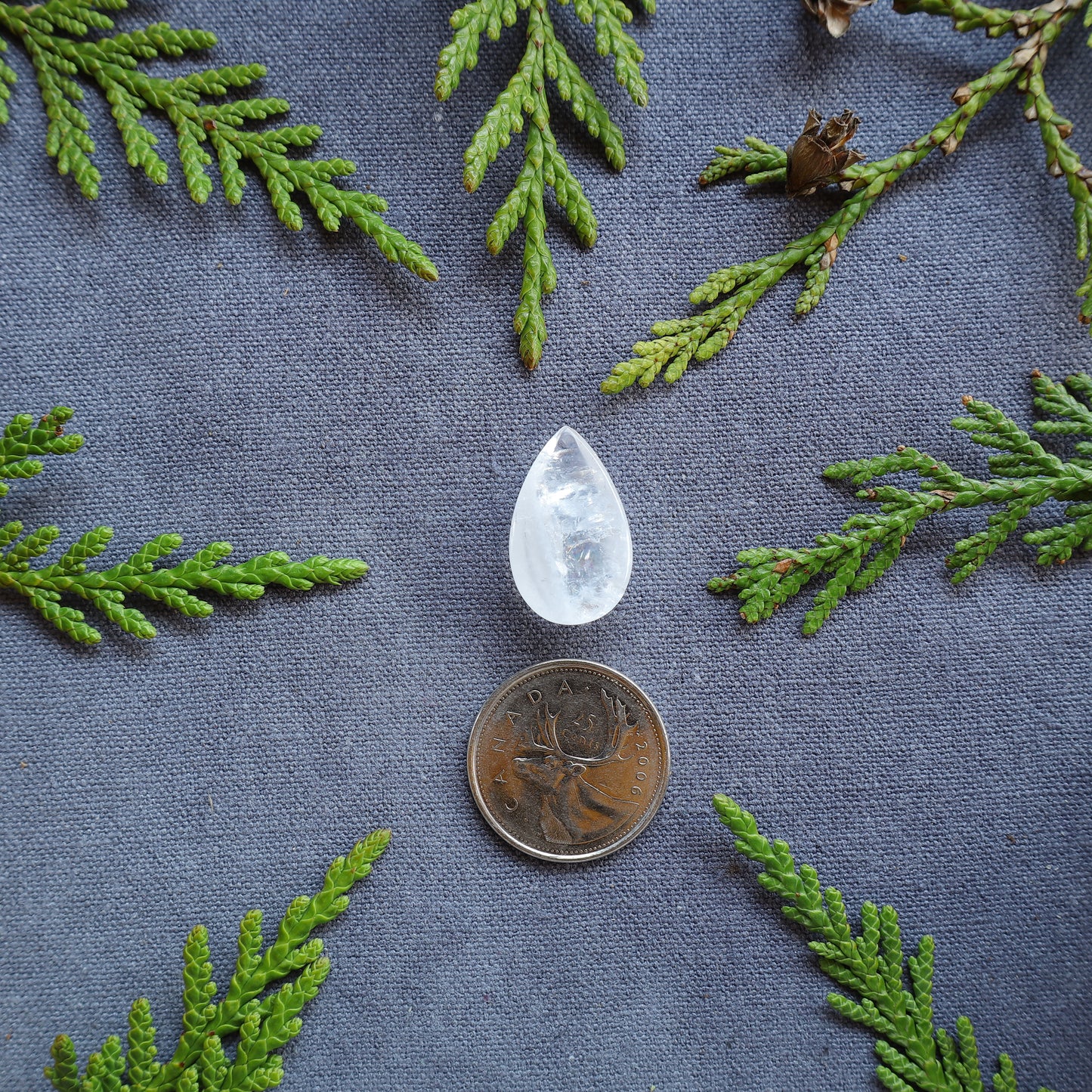 13.5ct Clear Quartz Cabochon With Rainbow inclusions, Skeena River, BC, Canada